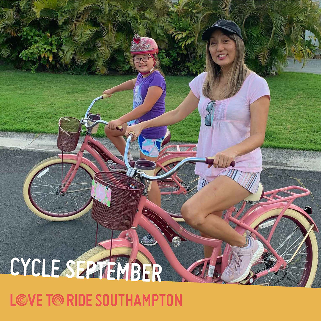 A woman and a girl pose on their matching pink shopper bikes and smile at the camera. The text says ‘Cycle September’ and the Love to Ride logo is displayed. A woman and a girl pose on their matching pink shopper bikes and smile at the camera. The text says ‘Cycle September’ and the Love to Ride logo is displayed.