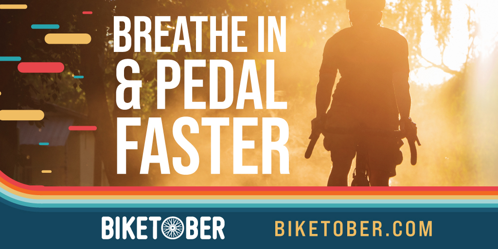 Rectangular graphic with text overlaid a photo of person riding a bike with the sunset behind them. The text says "Breathe in & pedal faster. biketober.com" Rectangular graphic with text overlaid a photo of person riding a bike with the sunset behind them. The text says "Breathe in & pedal faster. biketober.com"