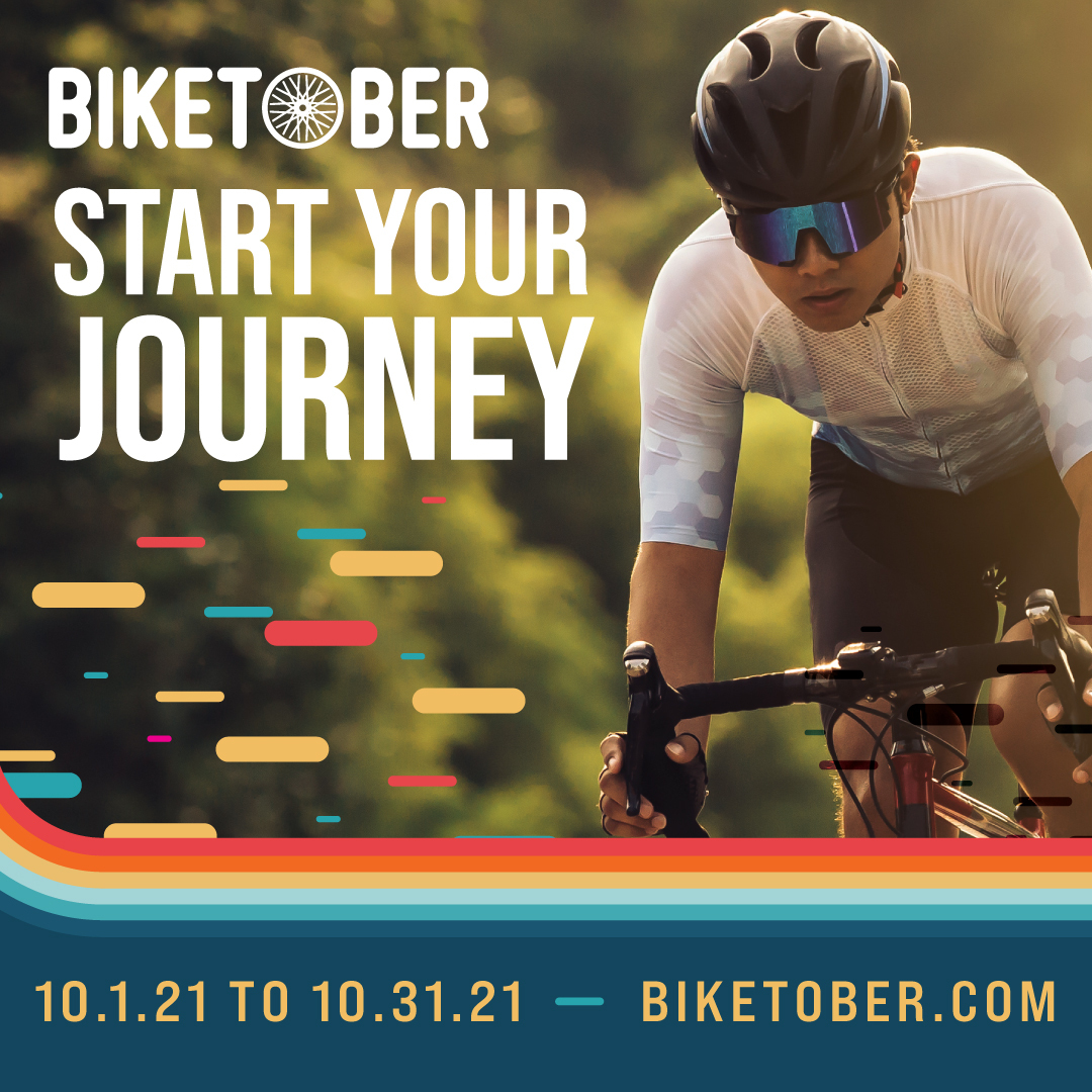 Text overlaid an image of a man riding a bike with a helmet and sunglasses. The text says "Biketober - start your journey. 10.1.21 to 10.31.21 - Biketober.com" Text overlaid an image of a man riding a bike with a helmet and sunglasses. The text says "Biketober - start your journey. 10.1.21 to 10.31.21 - Biketober.com"