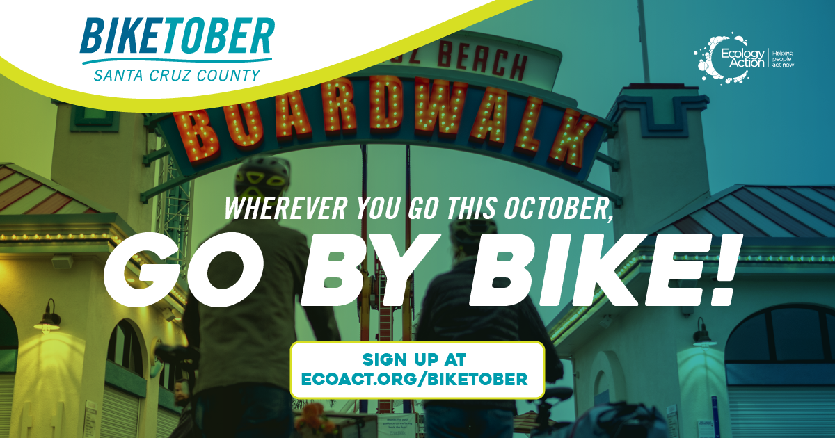 Biketober Santa Cruz County social media post with two people pushing their bikes down a road underneath a light up sign 'Boardwalk'. They have helmets on and the image has a green blue overlay theme. Text reads 'where you go this October, go by bike!'. Biketober Santa Cruz County social media post with two people pushing their bikes down a road underneath a light up sign 'Boardwalk'. They have helmets on and the image has a green blue overlay theme. Text reads 'where you go this October, go by bike!'.