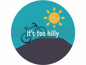 A circle containing an illustration of a bike going up a hill with a sun in the sky